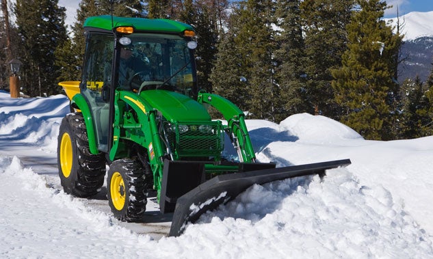 John Deere Tractor Winter Plowing