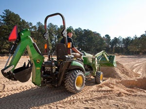 John Deere 1025R Loader Dumping