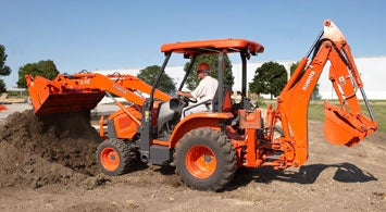 Used tractor with loader and backhoe