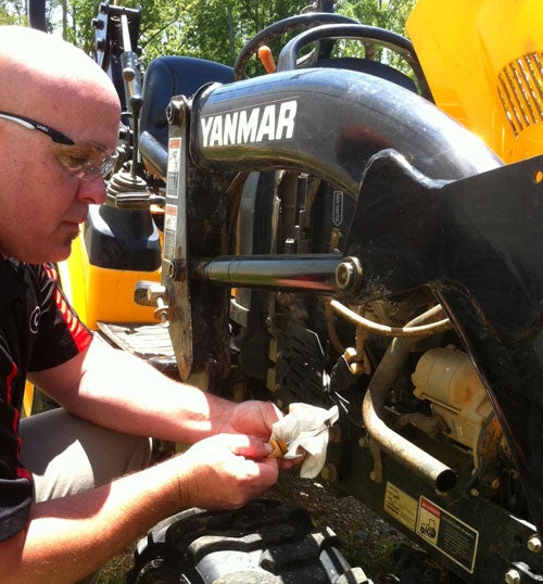 Checking Tractor Oil