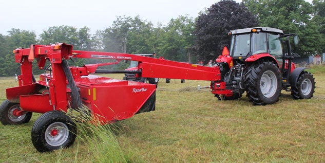 Hesston 1366 Disc Mower with Massey Ferguson 5609 Tractor