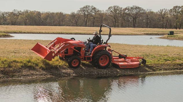 Kubota Grand L3560 Mowing